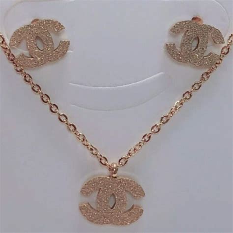 chanel inspired charm necklace|Chanel necklace and earring set.